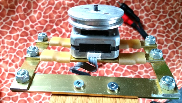 Stepper motor mounted on isolation plate